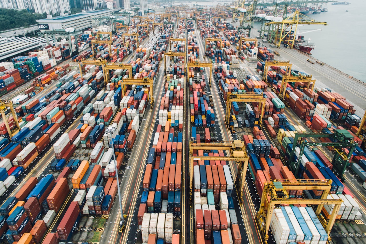 A container port operating at scale, seen from above